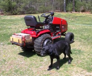 Tarsi guarding our new tractor. Making Preparations to 'Till the Land'